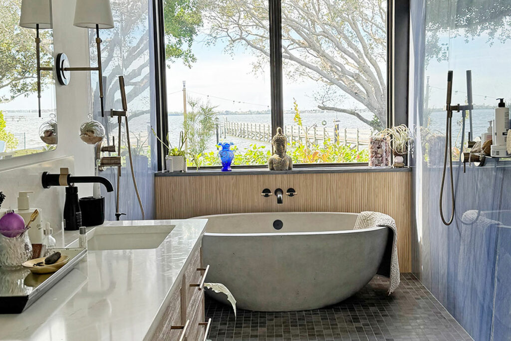 Luxury bathroom with a view of the lake.