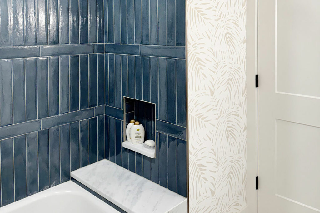 Coastal-style hallway with mirror and plants